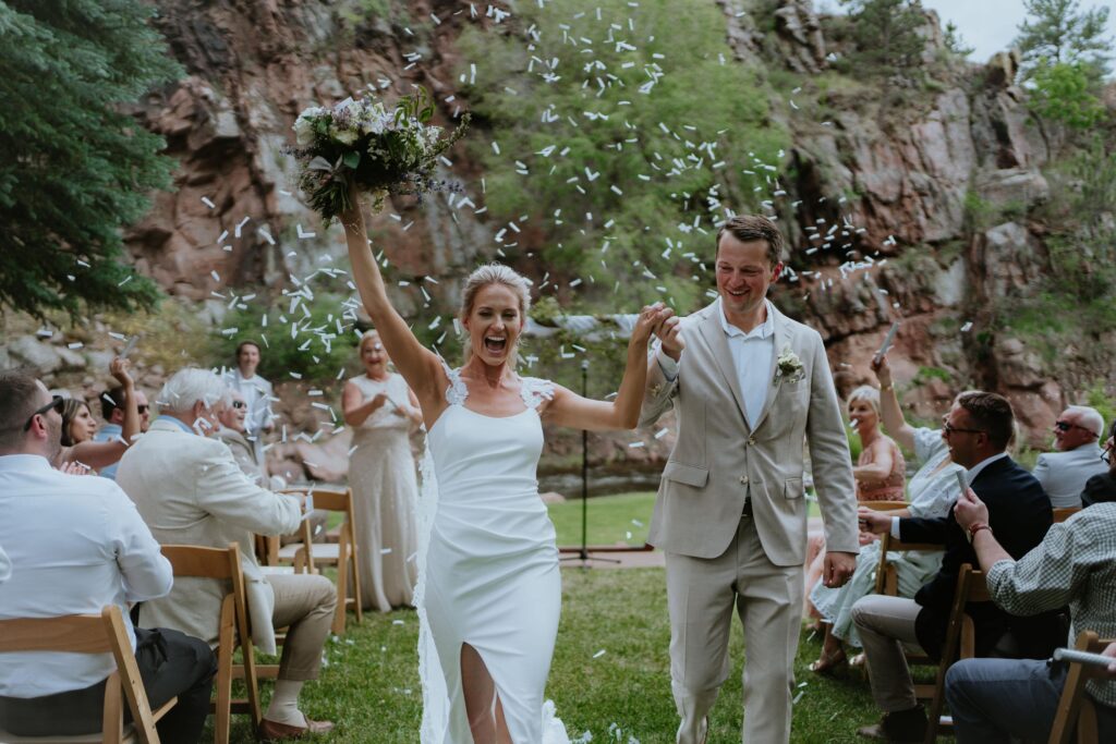 lyons farmette wedding couple walking down the isle