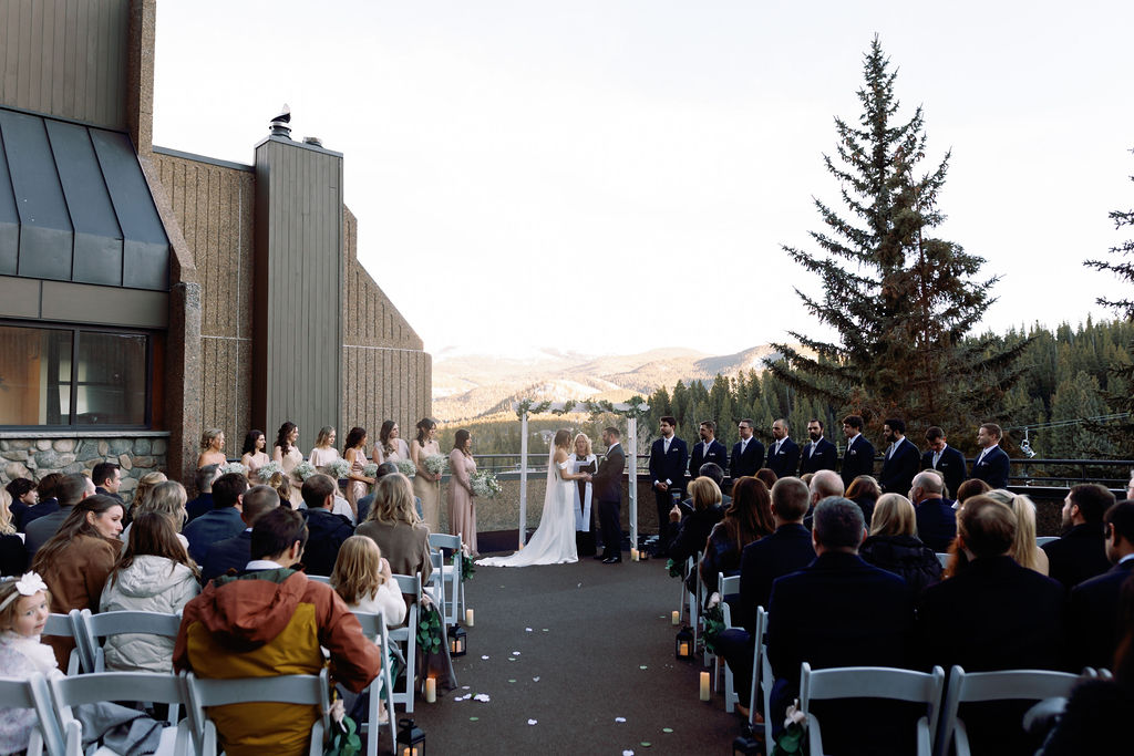 A look down the aisle during an outdoor patio ceremony