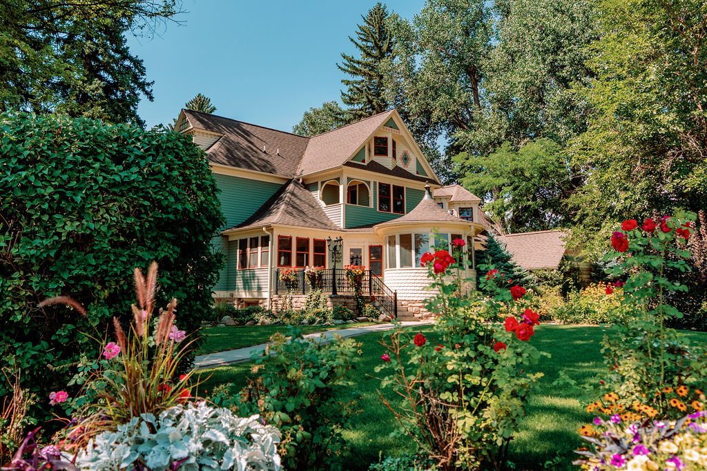 Details of the exterior of Tapestry House By Wedgewood Weddings and lush gardens