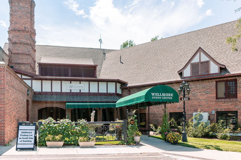 Details of the front entrance and gardens of the wellshire event center wedding venue